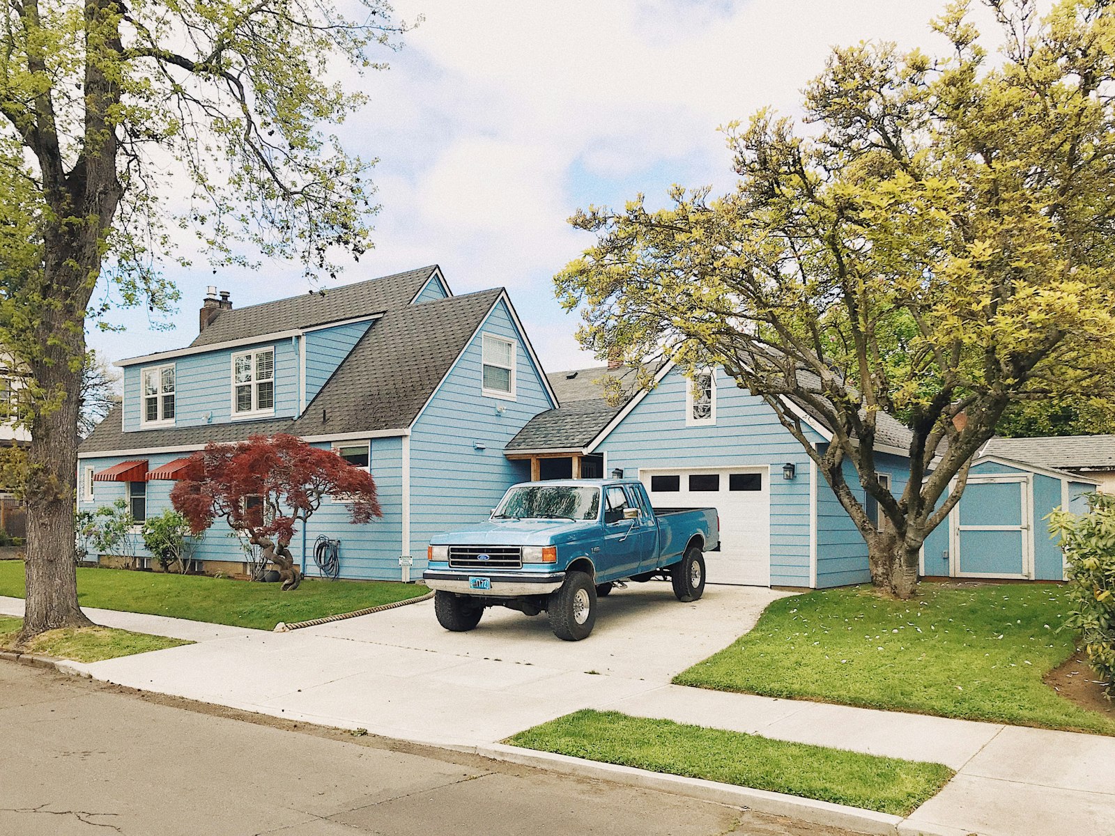 Work truck parked in the driveway of a residential Yakima home