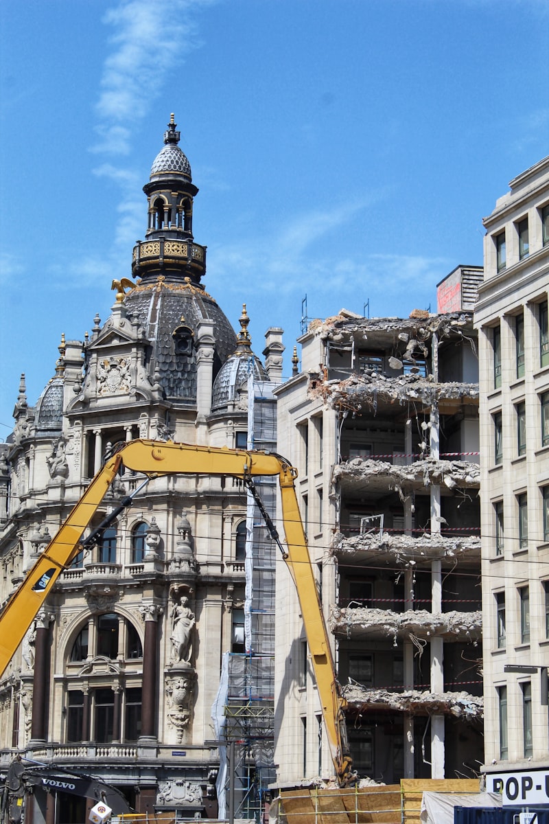 Historic white and gray building under blue sky
